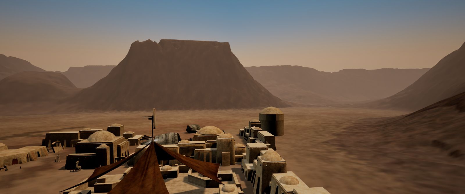 Mos Eisley's domed buildings seen from a rooftop, with a flat-topped mesa rising behind the town